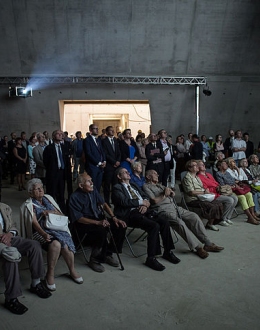 Invited guests watching the film about the Museum's main exhibition. Photo: Roman Jocher.