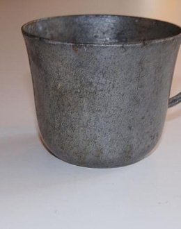 A drinking cup belonging to an exile in Siberia. The writing carved on its bottom is unfortunately no longer legible.
