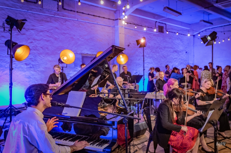 The twelve-member Small Dance Orchestra provided numerous reasons for celebration for the large crowd gathered at the Studio Solidarity of Salsa